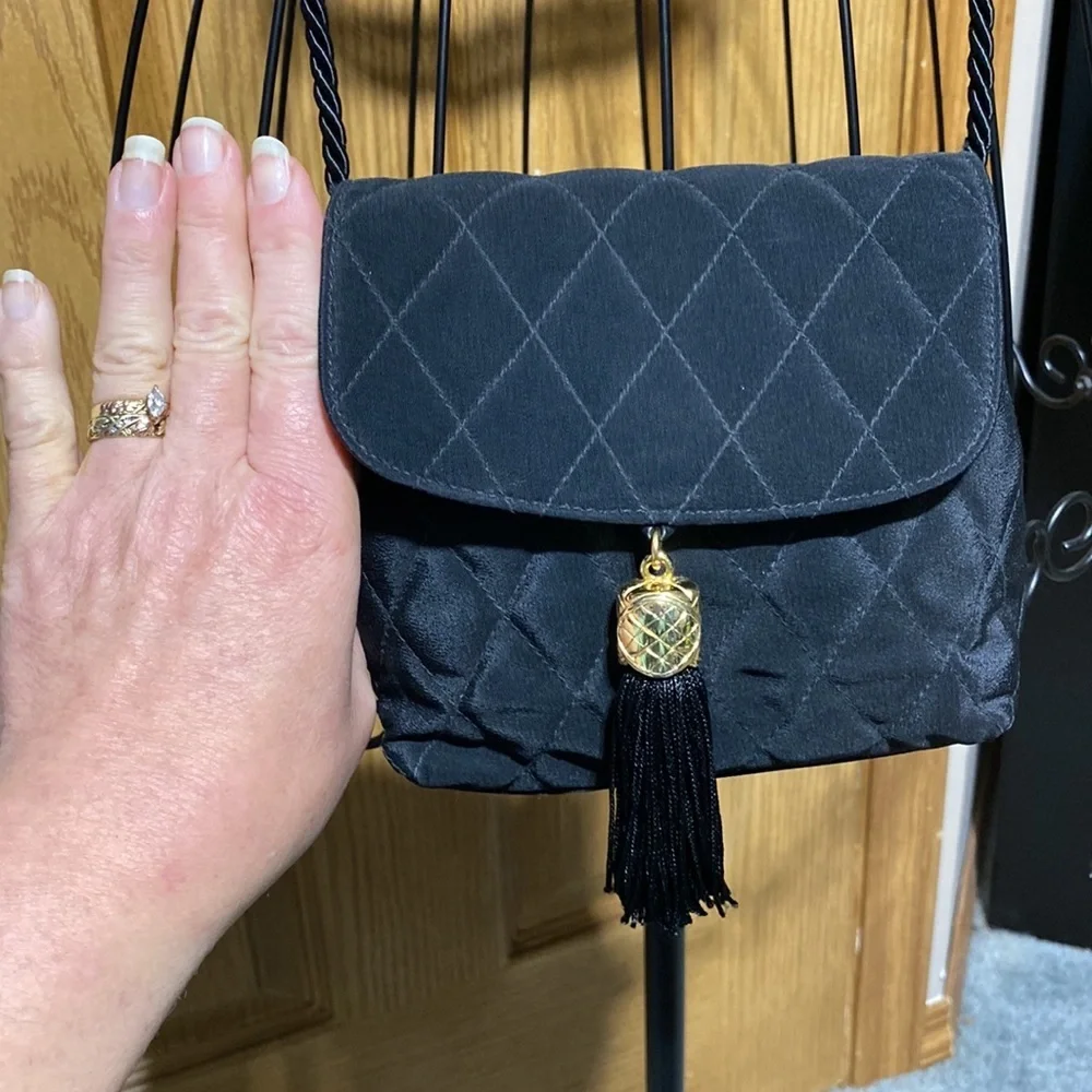 Neiman Marcus Gold Tassel Bag Small
Luxury purse​​ - Picture 7 of 11